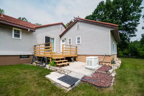 Exterior - 989 Mccabe Ave NE, Ada, MI 49301 photo 6 of 13