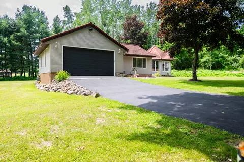 Exterior - 989 Mccabe Ave NE, Ada, MI 49301 photo 2 of 14
