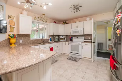 Kitchen - 989 Mccabe Ave NE, Ada, MI 49301 photo 2 of 3