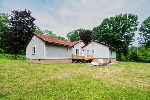 Exterior - 989 Mccabe Ave NE, Ada, MI 49301 photo 8 of 13