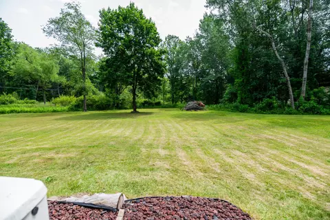 Exterior - 989 Mccabe Ave NE, Ada, MI 49301 photo 7 of 13