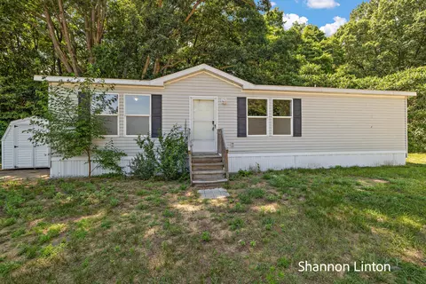 8783 Muirfield Dr, West Olive, MI 49460