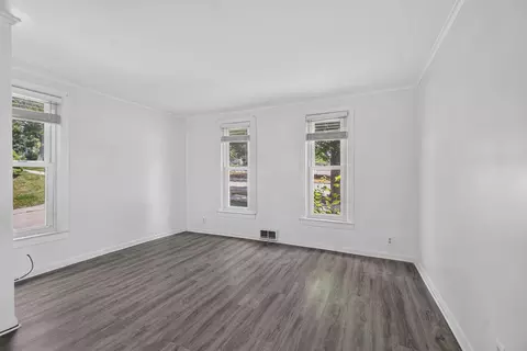 Living - 308 N State St, Jackson, MI 49201 photo 2 of 3