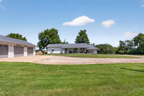 Exterior - 5010 Doty Rd, Osseo, MI 49266 photo 2 of 18