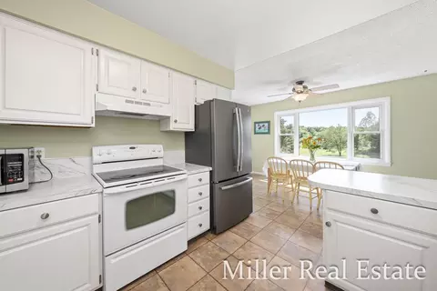 Kitchen - 4600 E Butler Rd, Dowling, MI 49050 photo 2 of 4