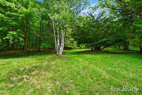 Exterior - 8275 Bailey Dr SE, Ada, MI 49301 photo 6 of 11