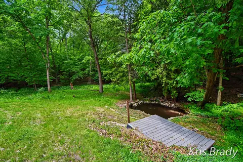 Exterior - 8275 Bailey Dr SE, Ada, MI 49301 photo 2 of 11