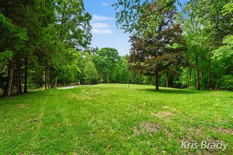 Exterior - 8275 Bailey Dr SE, Ada, MI 49301 photo 7 of 11