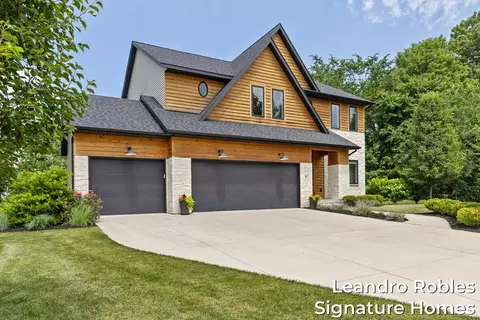 Exterior - 6 Fox Point Ct NE, Ada, MI 49301 photo 2 of 10