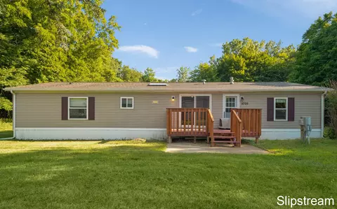 5705 E Riverside Dr, Lyons, MI 48851 photo 1