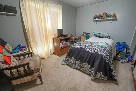 Bedroom - 910 Pleasant St, Belding, MI 48809 photo 3 of 4