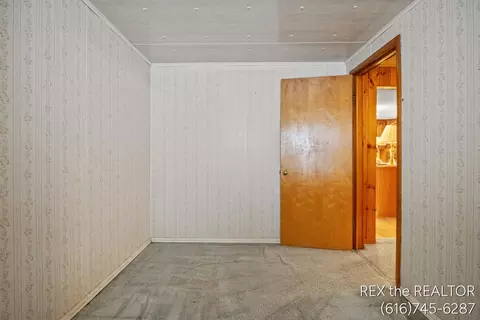 Bedroom - 167 W Brooks St, Newaygo, MI 49337 photo 2 of 5