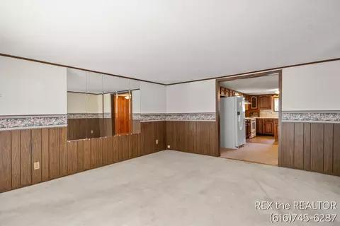 Living - 167 W Brooks St, Newaygo, MI 49337 photo 1 of 6