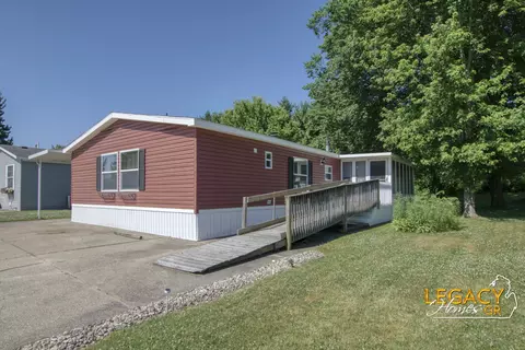 Exterior - 1163 Maple Leaf Ln NW, Walker, MI 49534 photo 4 of 9