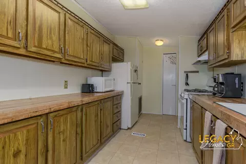 Kitchen - 1163 Maple Leaf Ln NW, Walker, MI 49534 photo 2 of 3