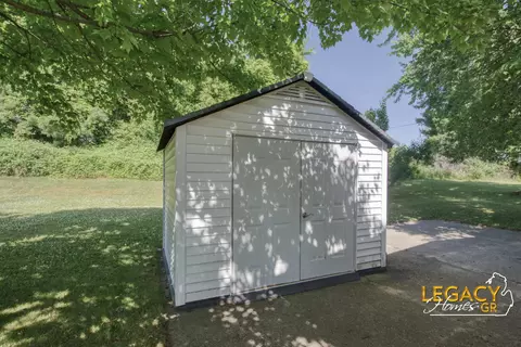Exterior - 1163 Maple Leaf Ln NW, Walker, MI 49534 photo 3 of 9