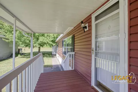 Exterior - 1163 Maple Leaf Ln NW, Walker, MI 49534 photo 6 of 9