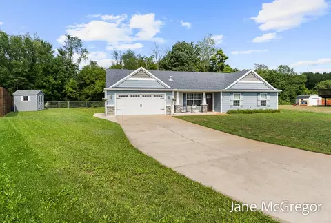 Exterior - 13820 E Harmony Ct NE, Sparta, MI 49345 photo 2 of 11