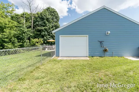 Exterior - 13820 E Harmony Ct NE, Sparta, MI 49345 photo 3 of 11