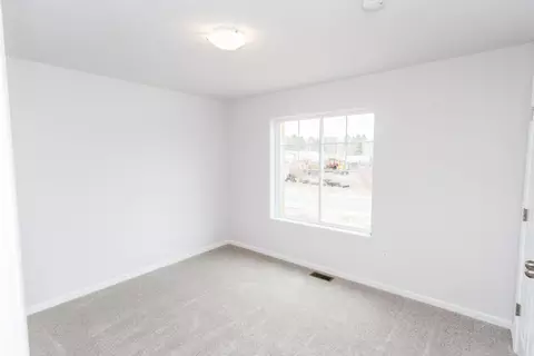 Bedroom - 165 Gooding St, Belding, MI 48809 photo 5 of 7