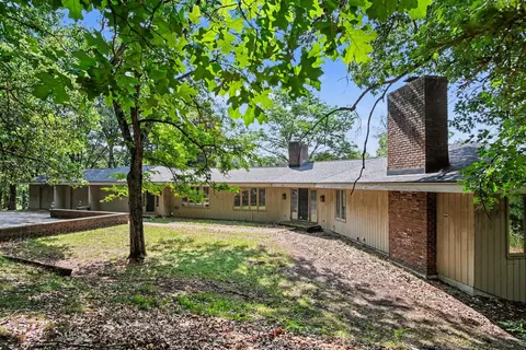 Exterior - 7701 Conservation St NE, Ada, MI 49301 photo 3 of 16