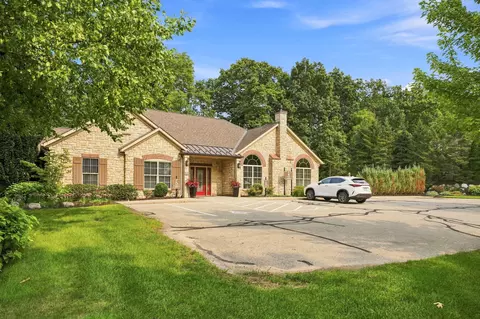 Exterior - 1073 Bridge Crst SE, Ada, MI 49301 photo 4 of 5