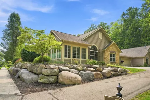 Exterior - 1073 Bridge Crst SE, Ada, MI 49301 photo 2 of 5