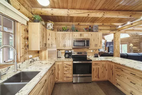 Kitchen - 302 E Kott Rd, Manistee, MI 49660 photo 3 of 4