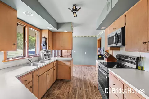 Kitchen - 311 Honey Creek Ave SE, Ada, MI 49301 photo 3 of 5