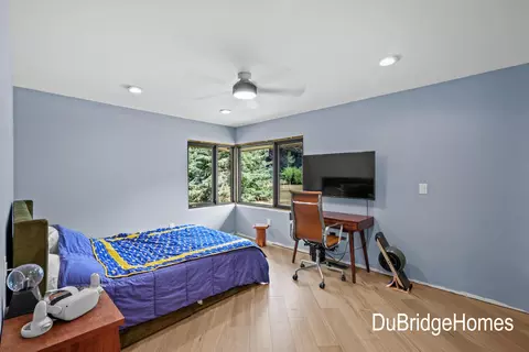 Bedroom - 311 Honey Creek Ave SE, Ada, MI 49301 photo 2 of 6