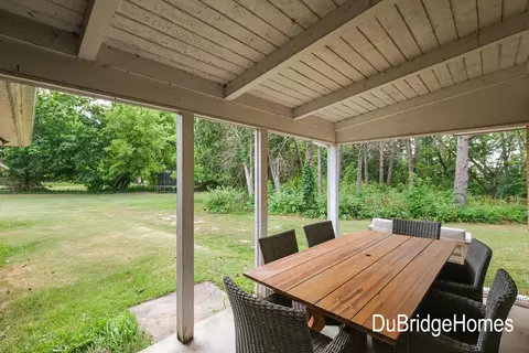 Exterior - 311 Honey Creek Ave SE, Ada, MI 49301 photo 3 of 7