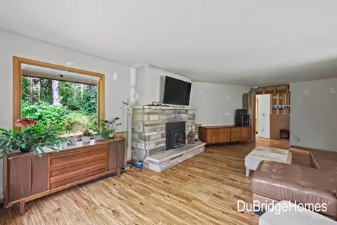 Living - 311 Honey Creek Ave SE, Ada, MI 49301 photo 2 of 4