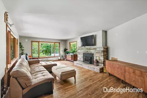 Living - 311 Honey Creek Ave SE, Ada, MI 49301 photo 1 of 4