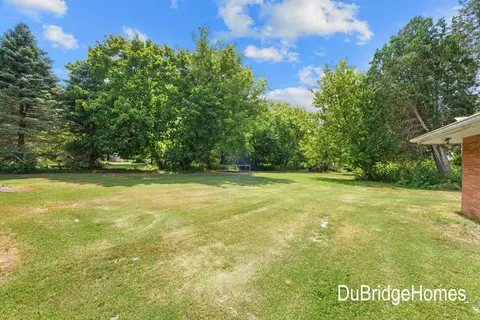 Exterior - 311 Honey Creek Ave SE, Ada, MI 49301 photo 7 of 7