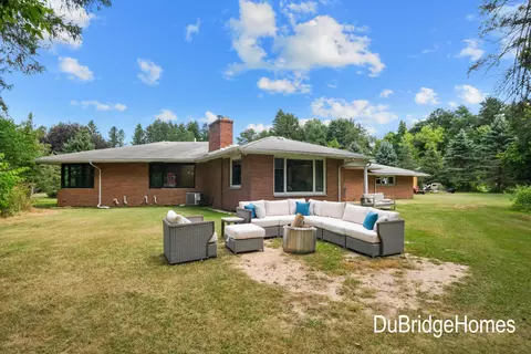 Exterior - 311 Honey Creek Ave SE, Ada, MI 49301 photo 5 of 7