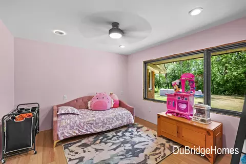 Bedroom - 311 Honey Creek Ave SE, Ada, MI 49301 photo 1 of 6