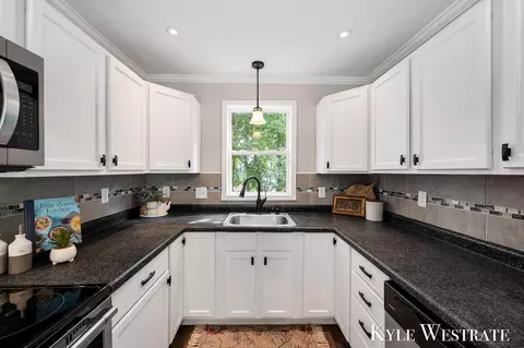 Kitchen - 315 N Bridge St, Belding, MI 48809 photo 2 of 3