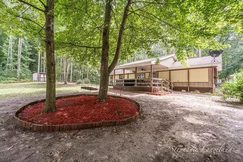 Exterior - 7972 S 192nd Ave, Holton, MI 49425 photo 5 of 10
