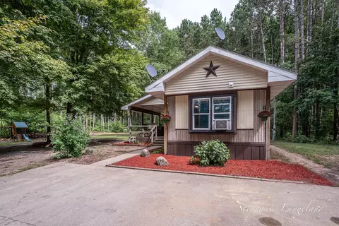 Exterior - 7972 S 192nd Ave, Holton, MI 49425 photo 2 of 10
