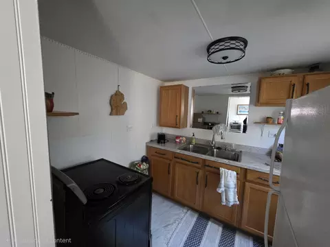 Kitchen - 530 Cherry St, Baldwin, MI 49304 photo 2 of 2