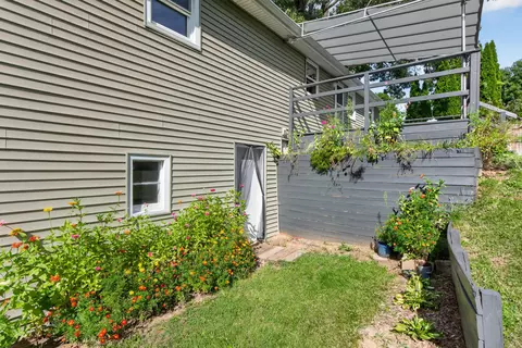 Exterior - 233 E Clark St, Jackson, MI 49203 photo 8 of 14
