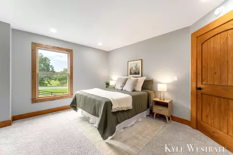 Bedroom - 8977 2 Mile Rd NE, Ada, MI 49301 photo 1 of 2
