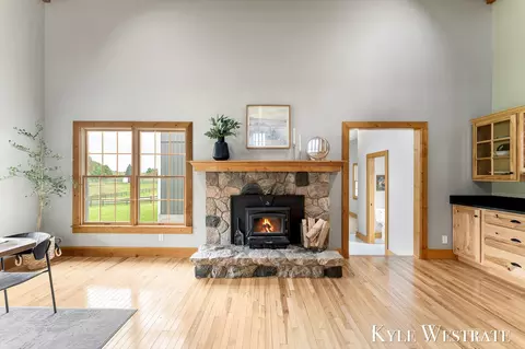 Living - 8977 2 Mile Rd NE, Ada, MI 49301 photo 1 of 4