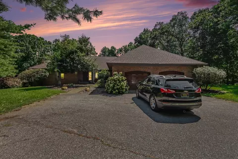 Exterior - 5075 Spring Ridge Dr NE, Ada, MI 49301 photo 2 of 5