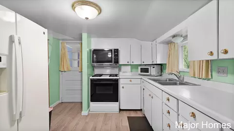 Kitchen - 417 W Main St, Stanton, MI 48888 photo 1 of 2