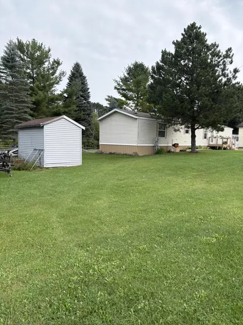Exterior - 1455 Eldon Ct, Gladwin, MI 48624 photo 5 of 22