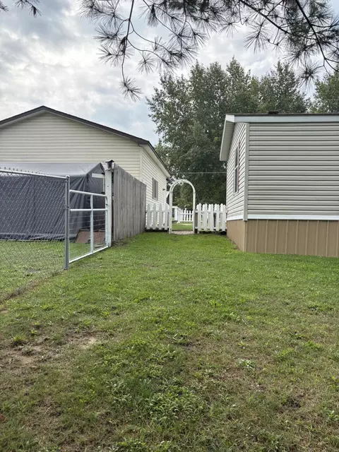 Exterior - 1455 Eldon Ct, Gladwin, MI 48624 photo 9 of 22