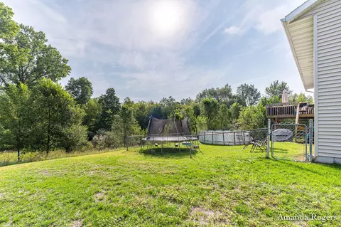 Exterior - 810 School Bell Ct, Belding, MI 48809 photo 4 of 7