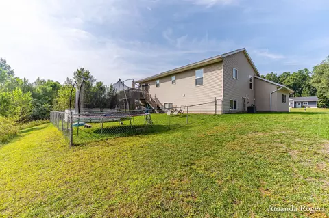 Exterior - 810 School Bell Ct, Belding, MI 48809 photo 5 of 7