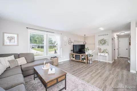 Living - 810 School Bell Ct, Belding, MI 48809 photo 2 of 2